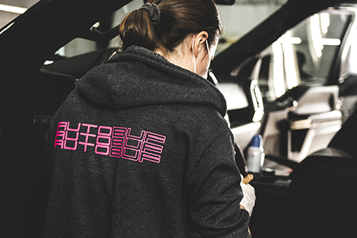 Autobuf Apparel | Girl wearing hoodie with Autobuf logo